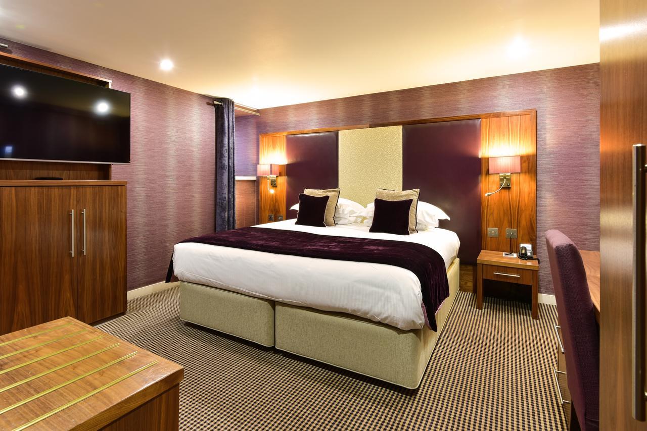 The Roseate Edinburgh - Small Luxury Hotels Of The World Exterior foto A Premier Inn bedroom